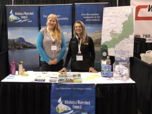 Staff at the AWC booth - Whitecourt Trade Show