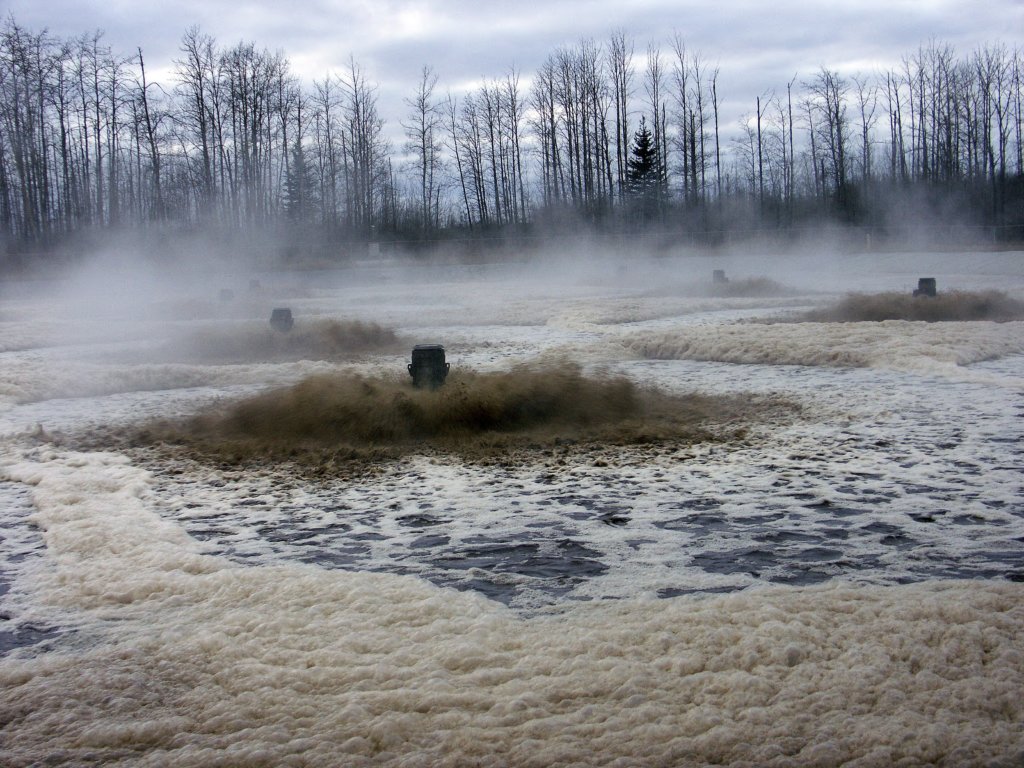 Aerators in sludge pond of Alberta-Pacific pulp mill